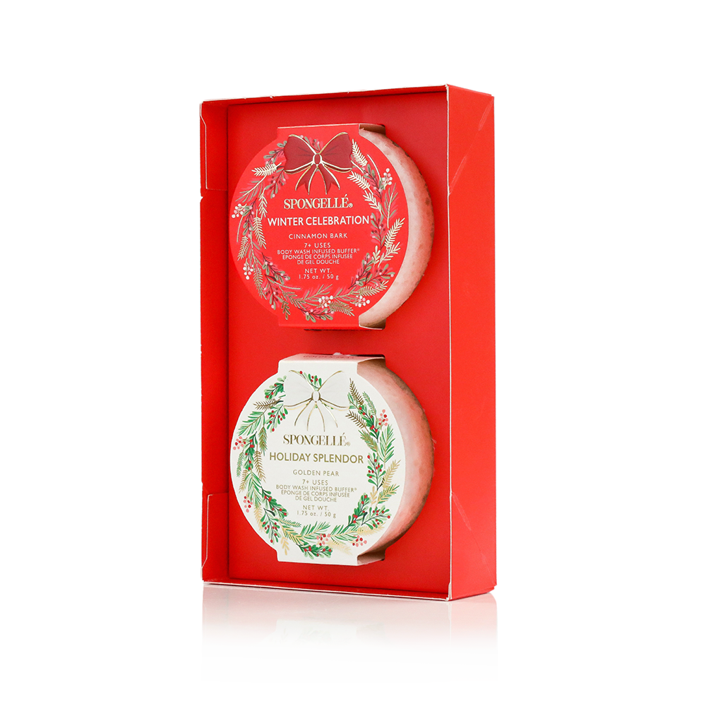 Two decorative holiday wreath body buffers inside red box packaging