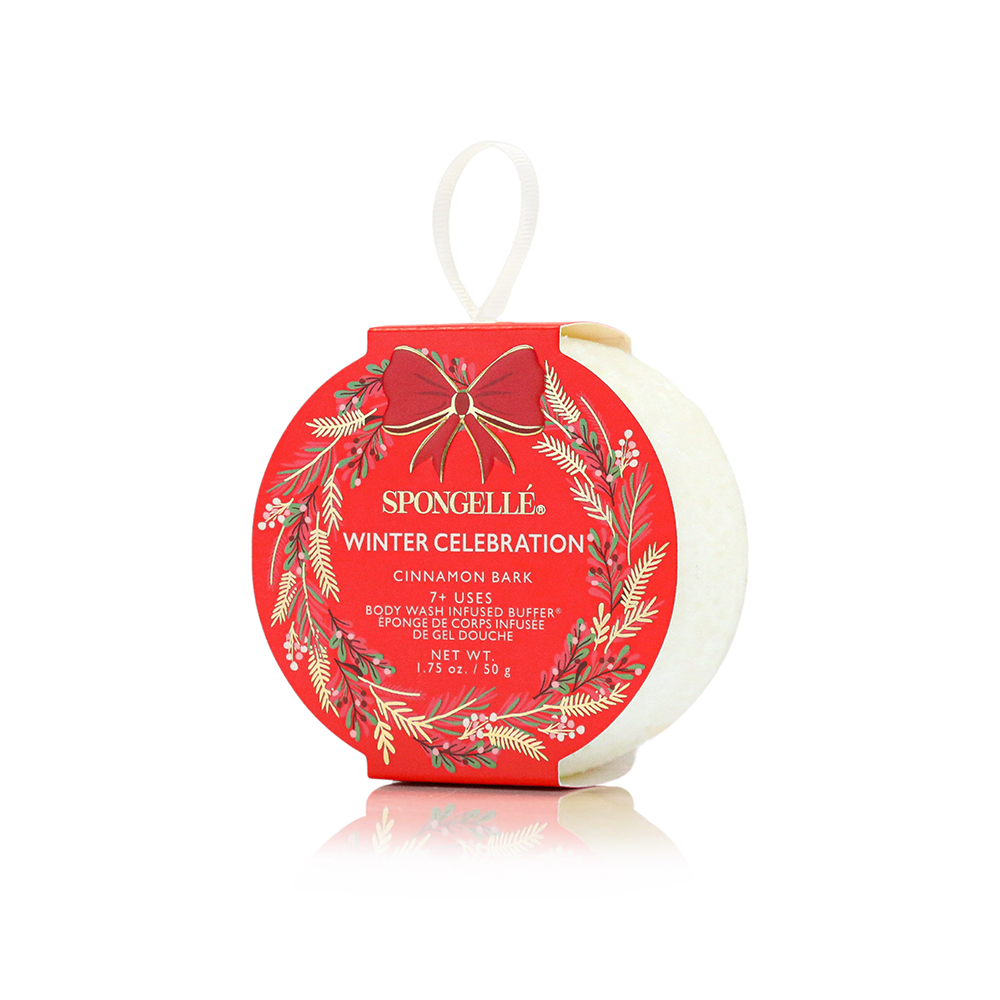 Spongellé Winter Celebration body buffer with red packaging on a white background